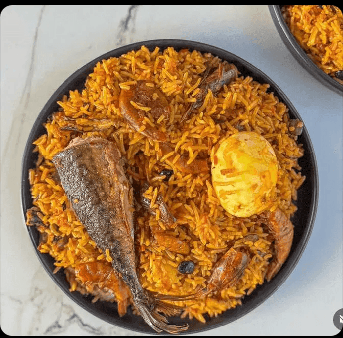 A close-up of a plate containing jollof rice.